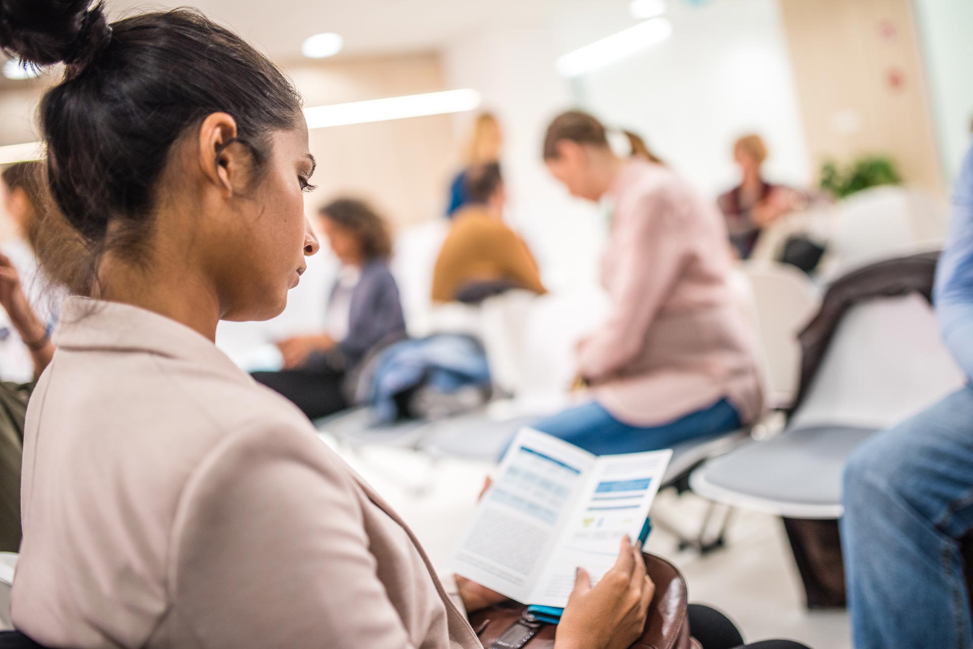 patient-waiting-room-reading-brochure